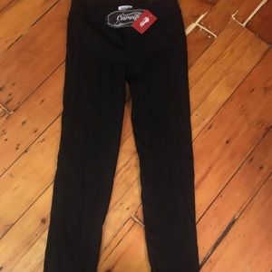 Black jeans with tummy cinching belt